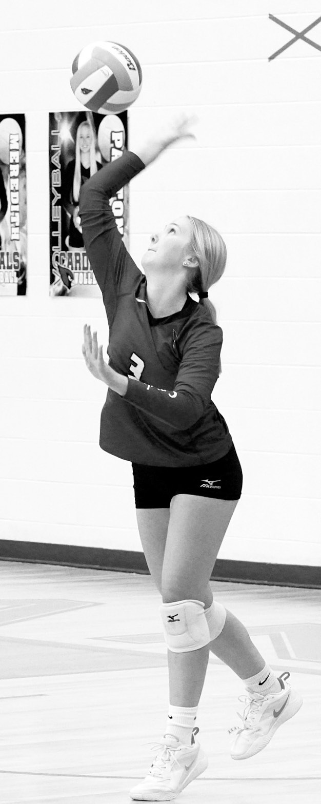 Player of the Game Payton Hall in the 3rd set she served 16 straight points, including 5 aces, plus 20 assists, and 8 digs in the win over the Indians. Photo by Larry Stokke.