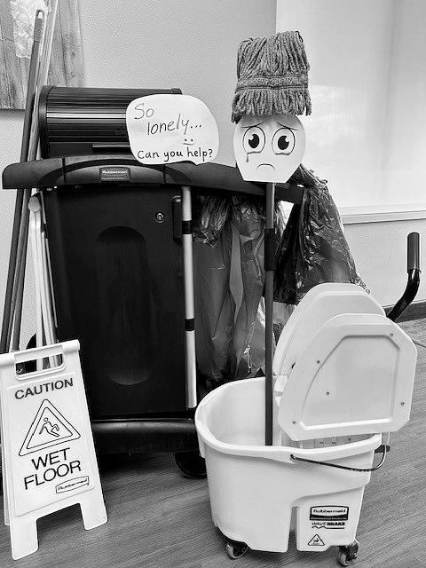 A lonely Mr. Moppy and his cart.