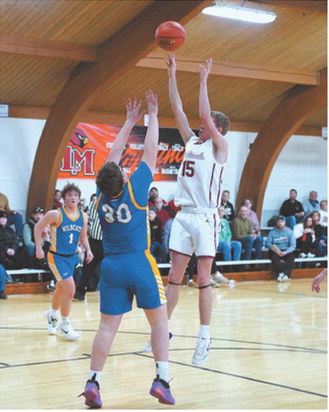 FM Bank Player of the Game Caleb McDonald in the win over Benson County in Munich on Jan. 24. McDonald had a great game finishing with 16 points. Photo by Larry Stokke