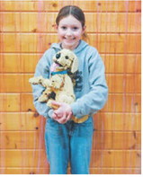 Kennedy Hartz shows her canine Lego creation. Submitted photo