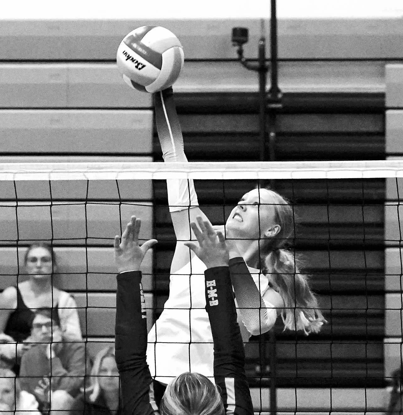 Hilary Haaven slams down a spike at the Northern Cass Tournament on Aug. 30. Photo by Larry Stokke.