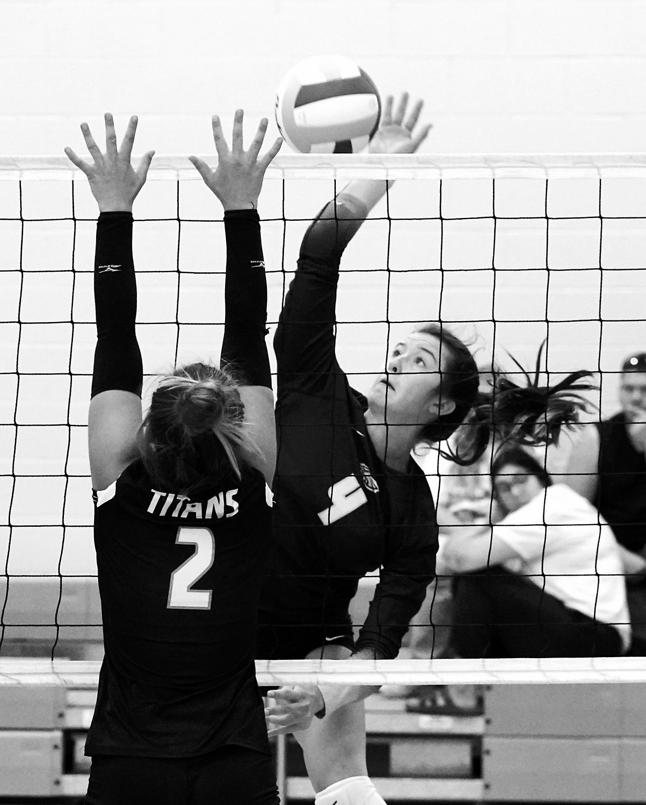 Jaelyn Johnson drives the ball over a DVE player at the Northern Cass Invitational. Photo by Larry Stokke.