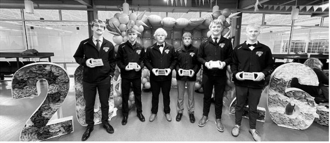 Congratulations Langdon Blades Junior Gold players on being named to the 2026 NDAHA All-State teams. Pictured left to right are 2nd Team All-State Keaton Ullyott, Forward; Max Henderson, Forward; Karter Lien, Defense. 1st Team All-State: Ryder Moser, Goaltender; Landon Schneider, Defense; Ty Ramberg, Forward. Submitted photo