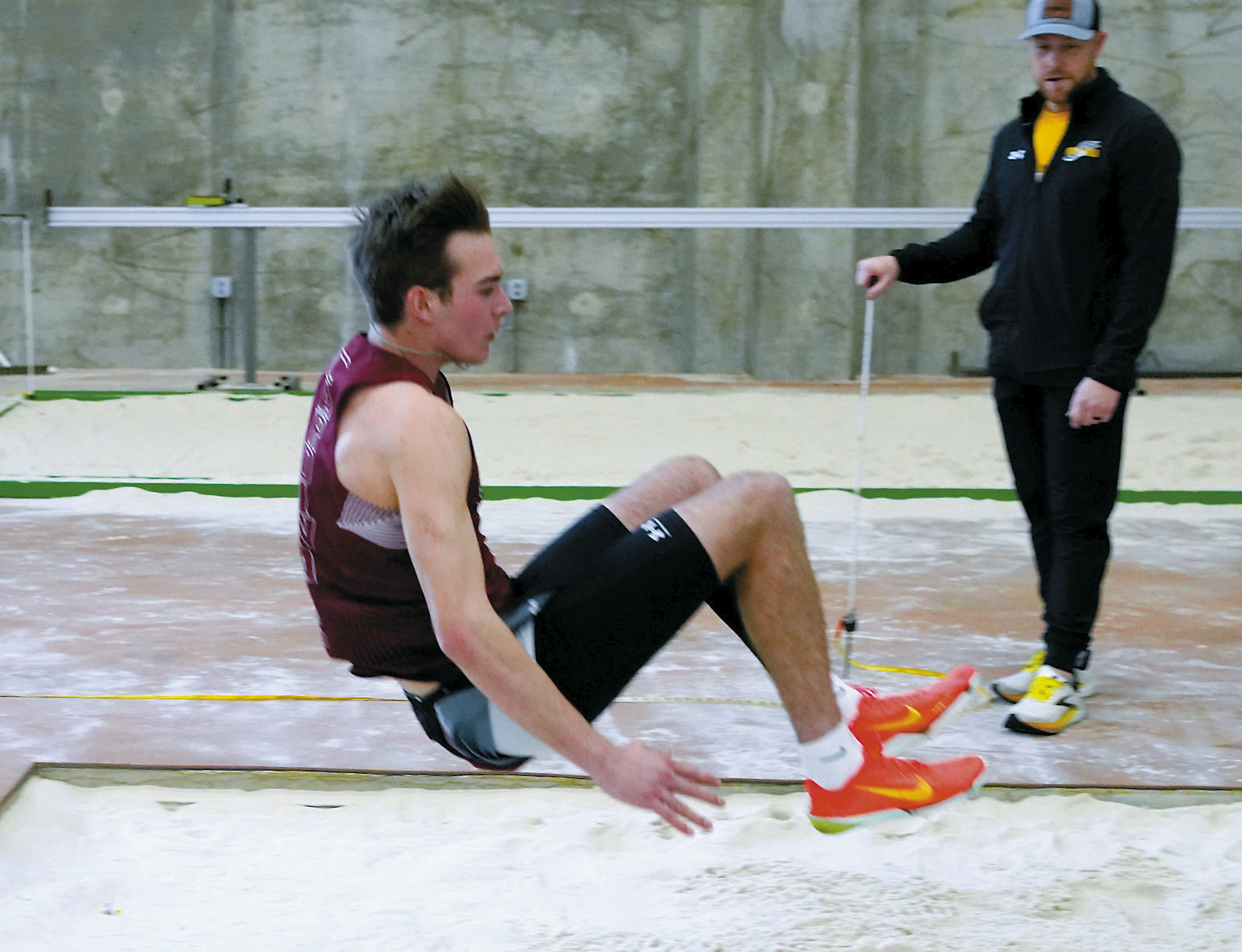 Tanner McDonald leaped 18'10' inches, placing him at 5th in the long jump. Photo by Larry Stokke.