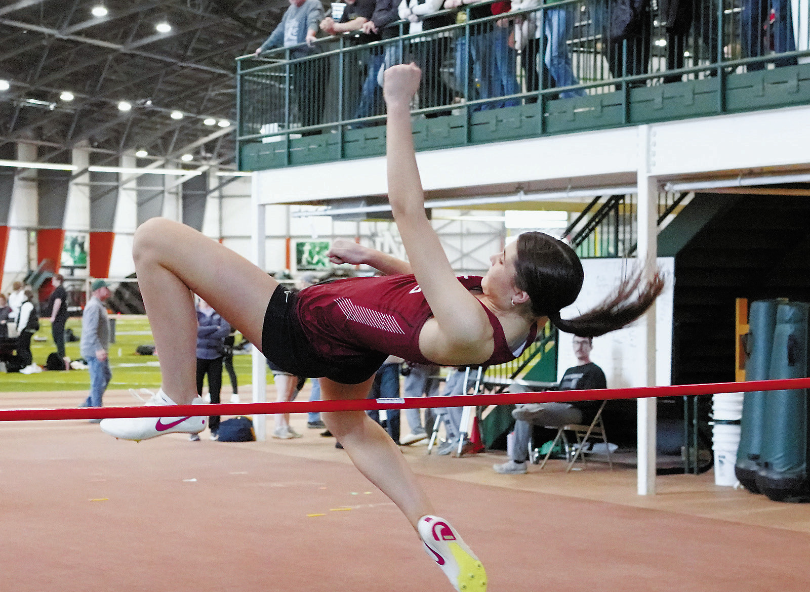 Taya Feist high jumped 4'8' inches to land in 2nd place at the meet. Photo by Larry Stokke.