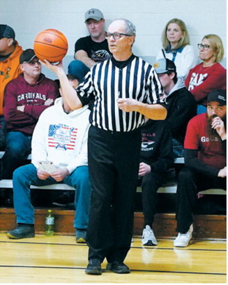 The man, the myth, the legend: Kevin Dawley is in his 52nd year officiating high school sports. Photo by Larry Stokke