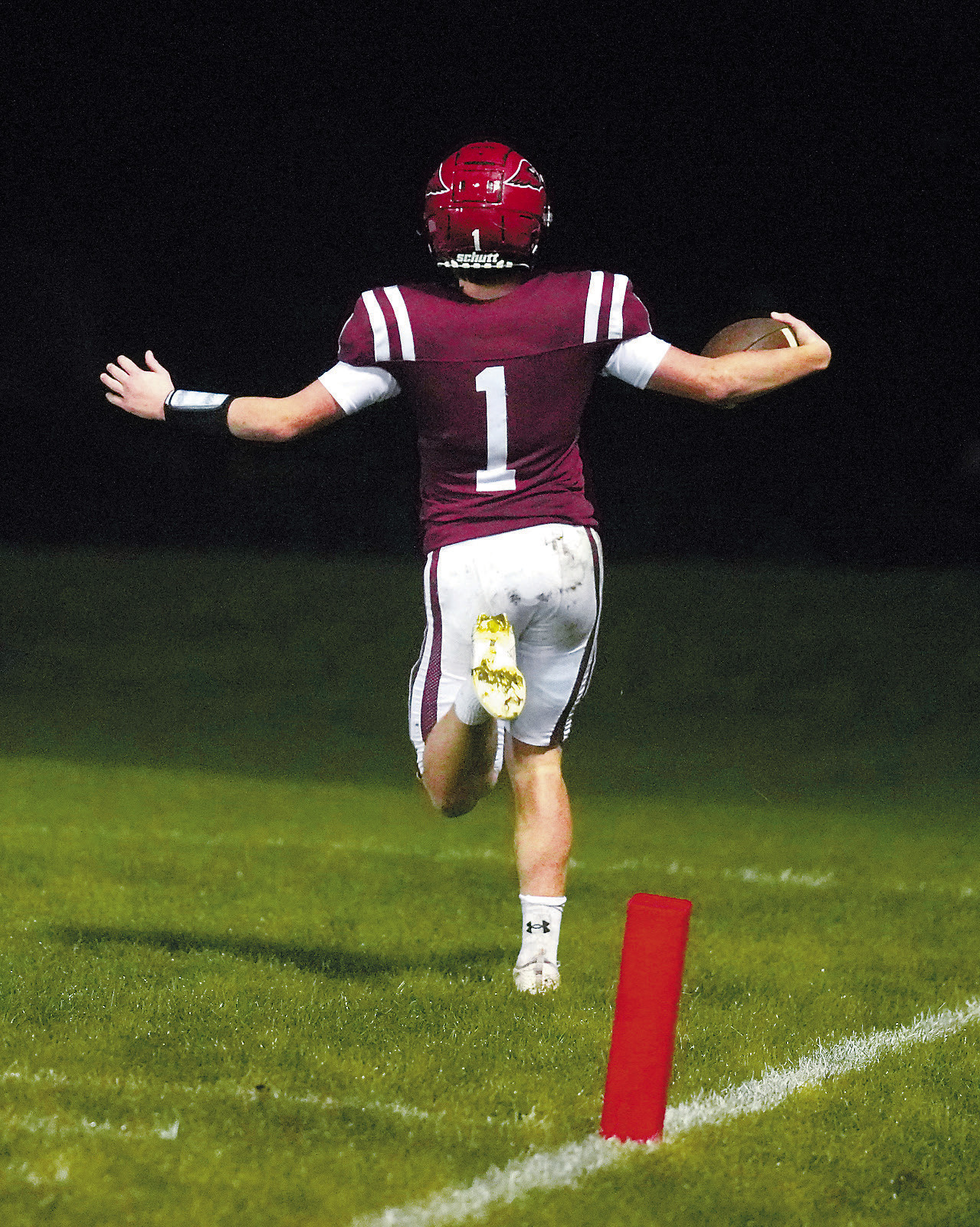 Eastyn Schaefer celebrates after catching a 66-yard punt return for a touchdown. Photo by Larry Stokke.