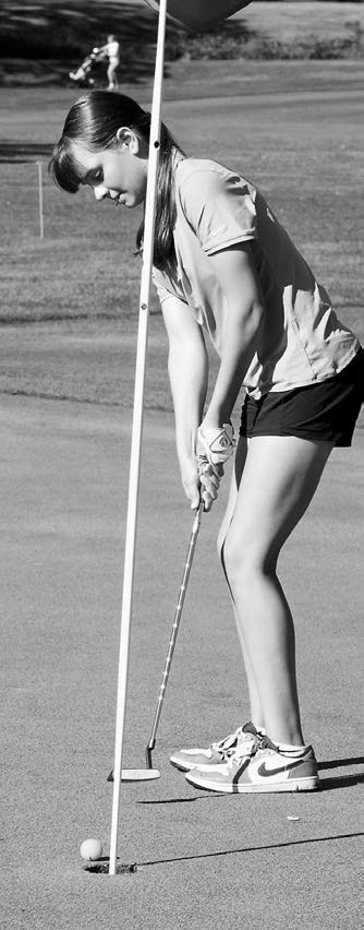 Lily Zimmer sinks a putt and shot a 104 for the day at the Grafton Invitational Meet. Photo by Larry Stokke.