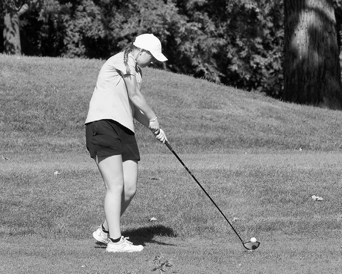 Nadia Lewis tees off in Grafton on Aug. 28 and finished the meet shooting a 104. Photo by Larry Stokke.