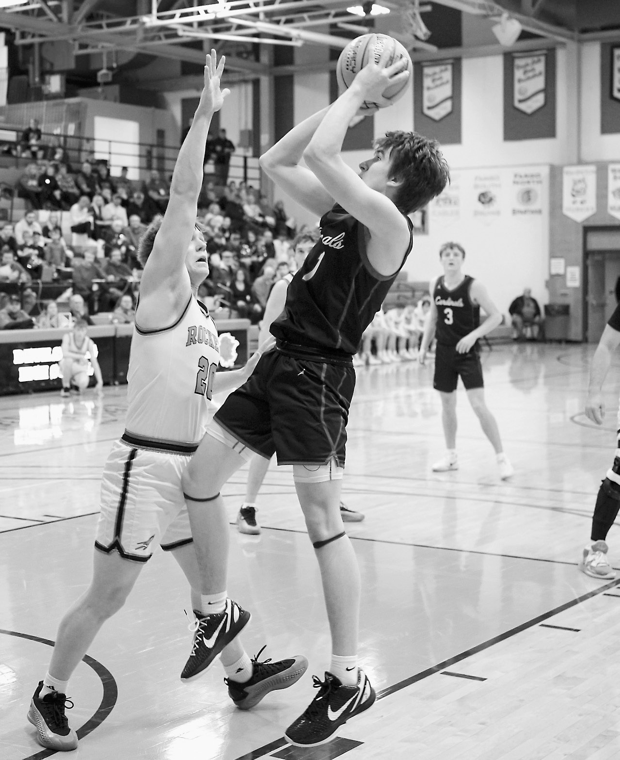 Eastyn Schaefer adds two points to his 16-point night against NR-S in Devils Lake on March 10. Photo by Larry Stokke.