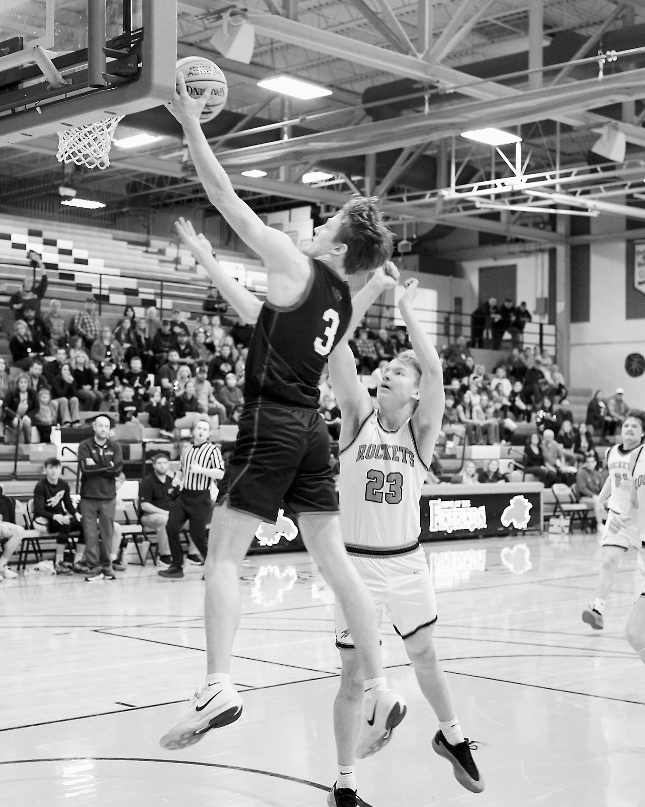 Co-Player of the Game Cody Amble lays in a basket in the Cards’ game against the Rockets. Photo by Larry Stokke.
