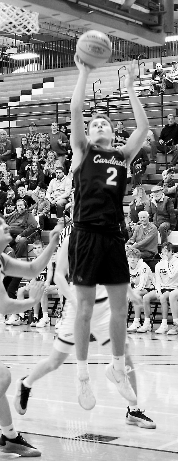 Tanner McDonald puts one in the hole against the NR-S Rockets. Photo by Larry Stokke.