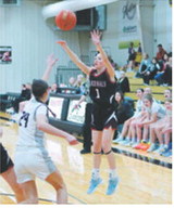 Ary Schaefer drops one of her 3-point shots in the hole in the win over the Chargers. Photo by Larry Stokke