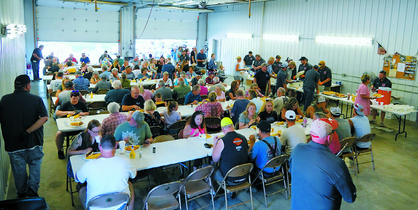 The fire hall was filled with attendees for the fundraiser hosted last week by the Walhalla Fire Department. Photo by Larry Stokke.