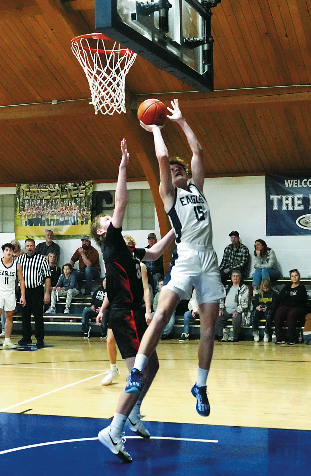 Garret Willits drops in two points in the win over Larimore on Dec. 20 in Pembina. Photo by Larry Stokke.