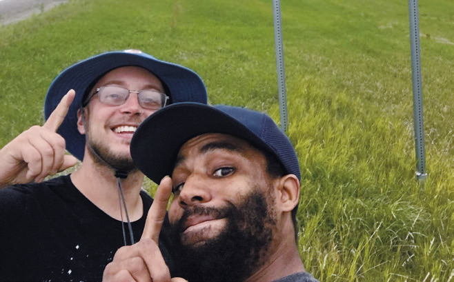 Left, Chuck Rannacher, one of the residents of the apartment building, and right, Simmons Multimedia’s very own D.J. Bartley.