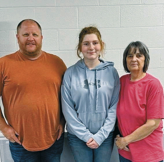 From left to right, Jay Brusseau, committee member; Miranda Waterbury, 2024 scholarship recipient; and Deb Peterson, Mike Peterson’s mother. Submitted photo.