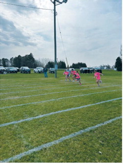 Young runners sprint from the starting line during one of the races at North Border School's Track and Field Day. Students spent the day competing in a variety of events while celebrating the final days of the school year. Submitted photo