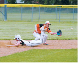 Sam Johnson slides safely into second base ahead of the throw during the Babe Ruth game against Drayton on June 16. Photo by Larry Stokke