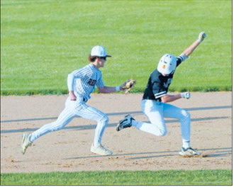 Connor Mitchell applies the tag to retire a Grafton runner during the Red Sox’s victory over Grafton on June 11. Photo by Larry Stokke