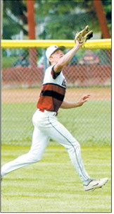 Cody Amble tracks down a deep fly ball in center field and makes the catch for an out during recent Red Sox action. Photo by Larry Stokke