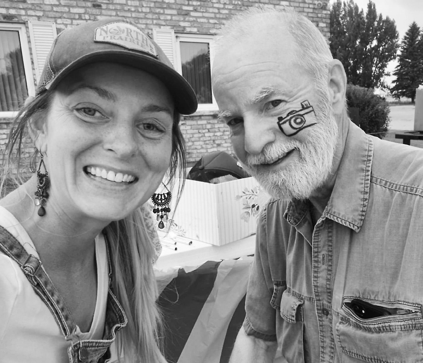 Larry Stokke rocking his camera facepaint at the carnival.