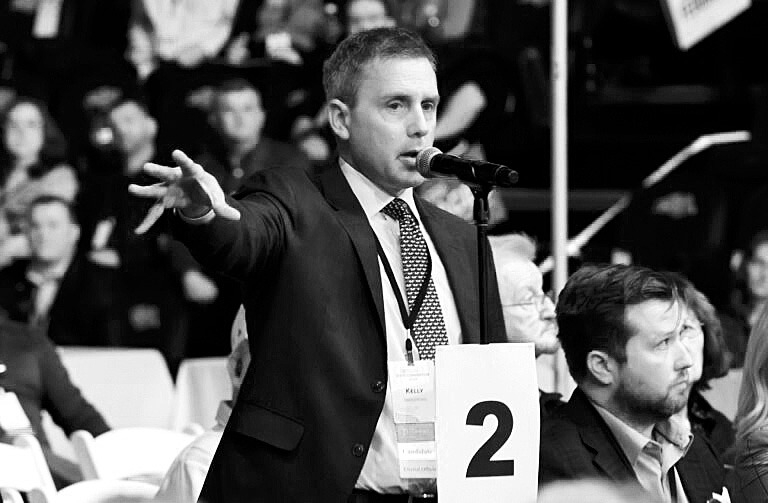 Rep. Kelly Armstrong speaks on the floor of the 2024 NDGOP Convention at the Sanford Athletic Complex in Fargo on April 5, 2024. Armstrong is running for governor of the North Dakota. (Michael Achterling/North Dakota Monitor)