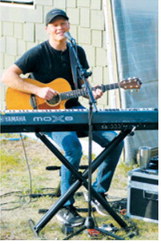 Jordan Thornburg performs during the special night market, which featured live music, food, desserts and a variety of local vendors. Photo by Larry Stokke