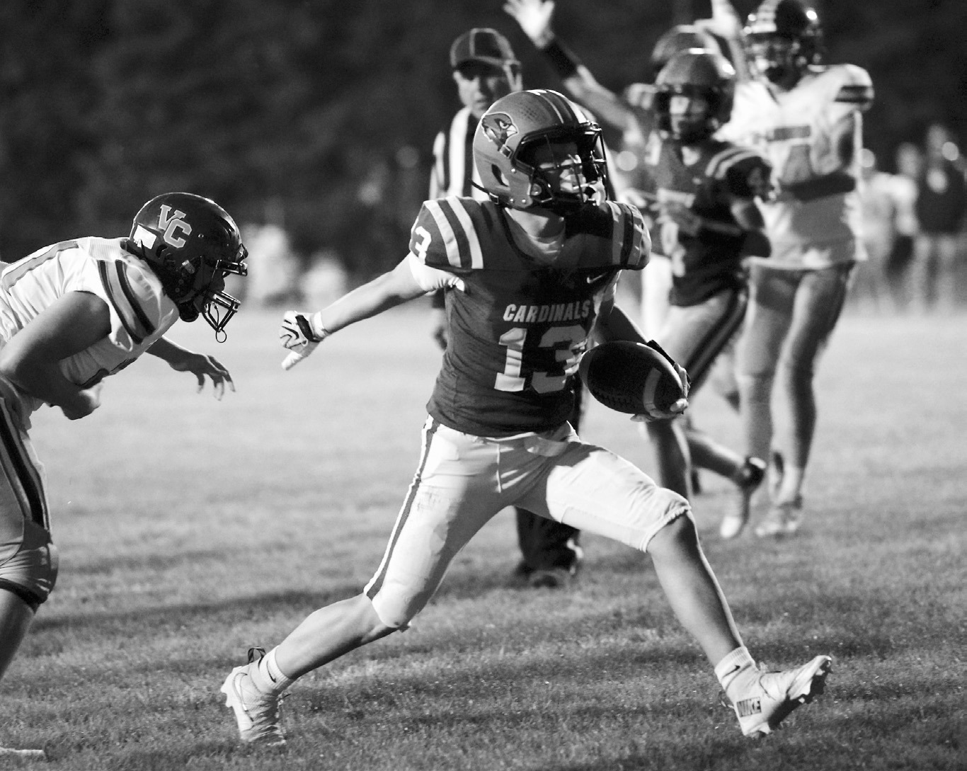 Gavin Trottier breaks away from a Valley City defender to score on a 12-yard run. Photo by Larry Stokke