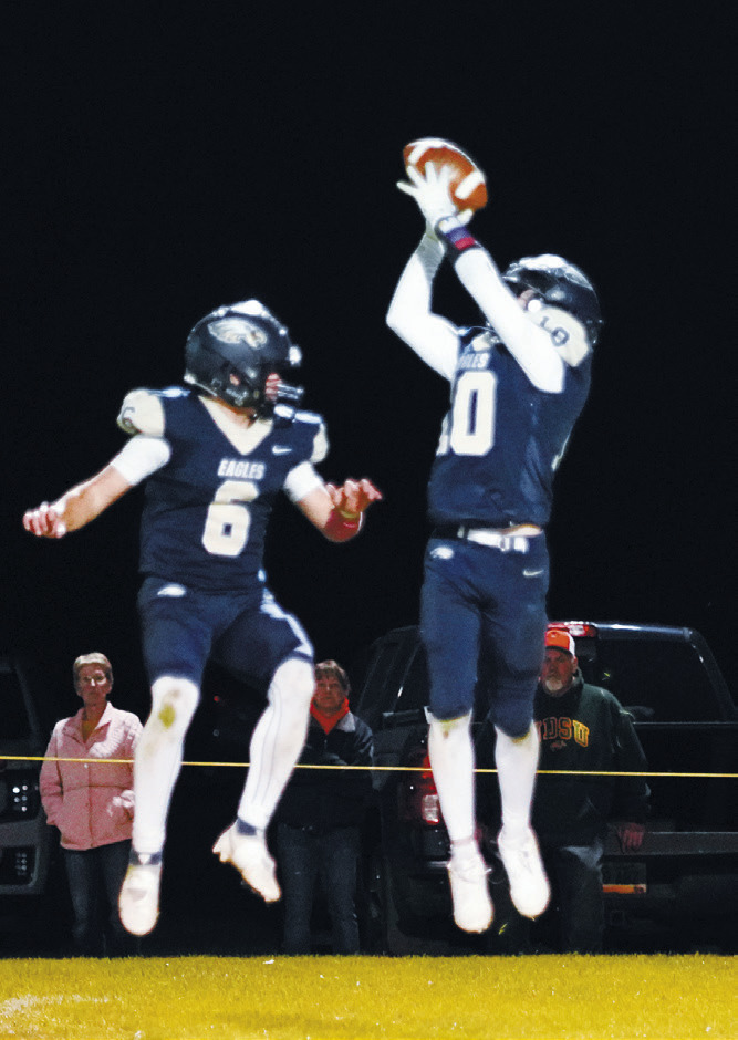 Kaden Moore intercepts the ball and runs it back down to the Eagles end of the field. Photo by Larry Stokke.
