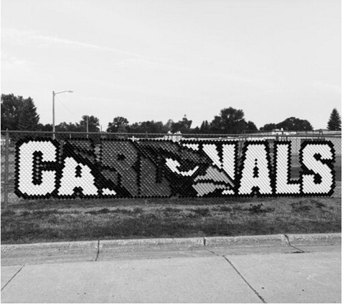 A new Cardinals fence display made from colorful 'Put-In-Cups' adds school spirit outside the Langdon school campus. The project was made possible through a donation from the Langdon Eagles Club 3454. Borderland Press photo