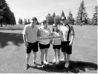Third place: Members of the Wells Drinking Well team, from left - Steve Wells, Kristy Belcher, Amy Skibicki and Grant Skibicki - earned third place at the 2026 First Care Health Center Benefit Golf Tournament in memory of Dan Young. Submitted photo