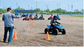 A child participates in a North Dakota OHV Youth Safety Course certification training program held during an NDSU Extension Farm Safety Camp. NDSU photo