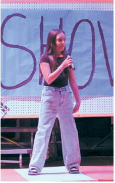 A student performs on stage during the Langdon Area Elementary Talent Show. The end-of-the-year event gave students an opportunity to showcase their creativity, confidence and unique talents before a live audience. Photo by Larry Stokke
