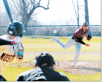Theo Romfo recorded 12 strikeouts in the Cardinals’ win over Midway/Minto on April 23 in Minto. Photo by Larry Stokke