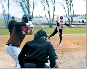 Colter Kakela eyes the batter and sends a pitch across the plate. Photo by Larry Stokke
