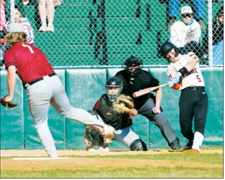 Landon Schneider was a wall behind the plate for the Cardinals against the Mustangs. Photo by Larry Stokke