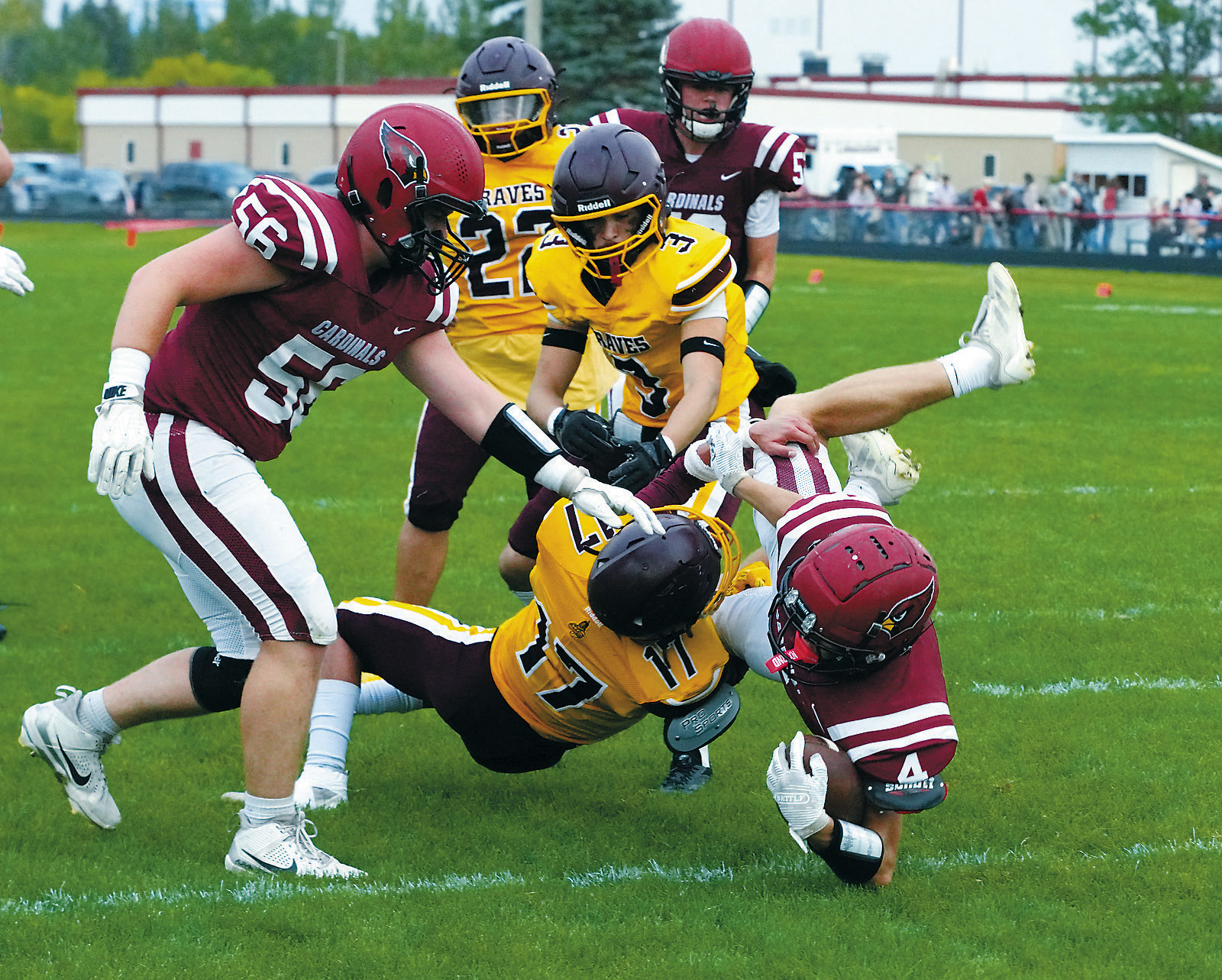 Sam Davis eludes a tackle and gets over the goal line to tack on six points. Photo by Larry Stokke.