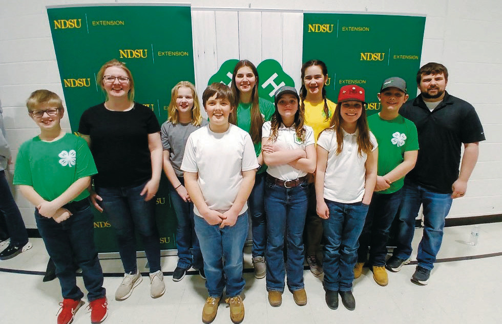 Pembina County Agronomy Team: Front row (L-R) Levi Norrell, Oscar Hunter, Olive Moore, Chloe Hunter; back row, Coach Shana Norrell, Stella Norrell, Anja Schluchter, Naomi Stegman, Rylan Moore and Coach Brandon Breckheimer.