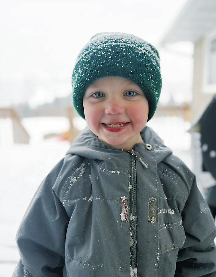 Huxley enjoying the first snow of the season. Photo courtesy of Sarah Overby.