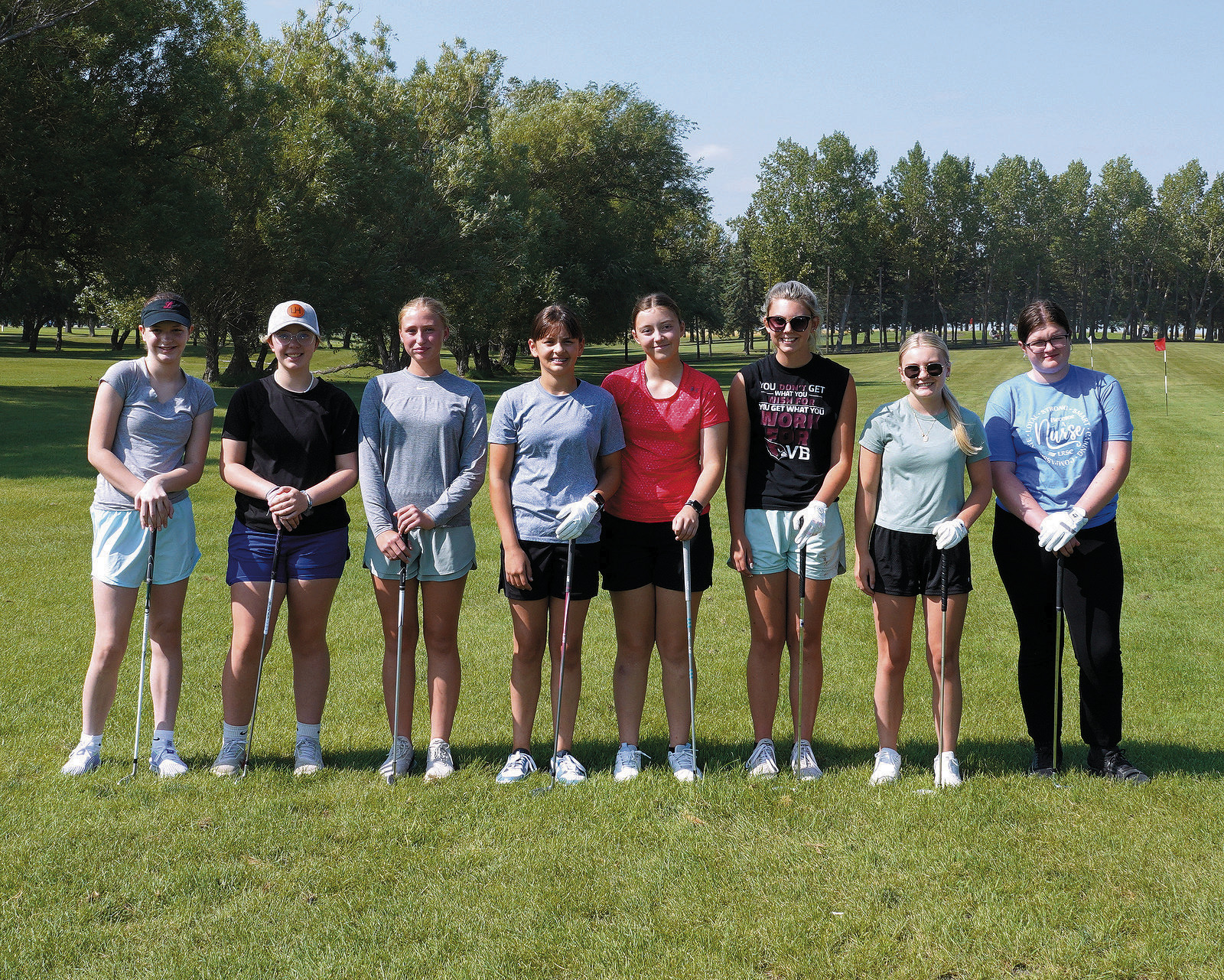 The Lady Cards 2024 Golf Team (L-R) Roslyn Pankratz, Kynlee Pengilly, Maci Witzel, Lily Zimmer, Nadia Lewis, Rylee Medbery, Catelyn Goodman, and Matilda Lawson. Not photographed, Finley Crockett, Makayla Bartlett, and Kaydence Wirth. Photo by Larry Stokke.