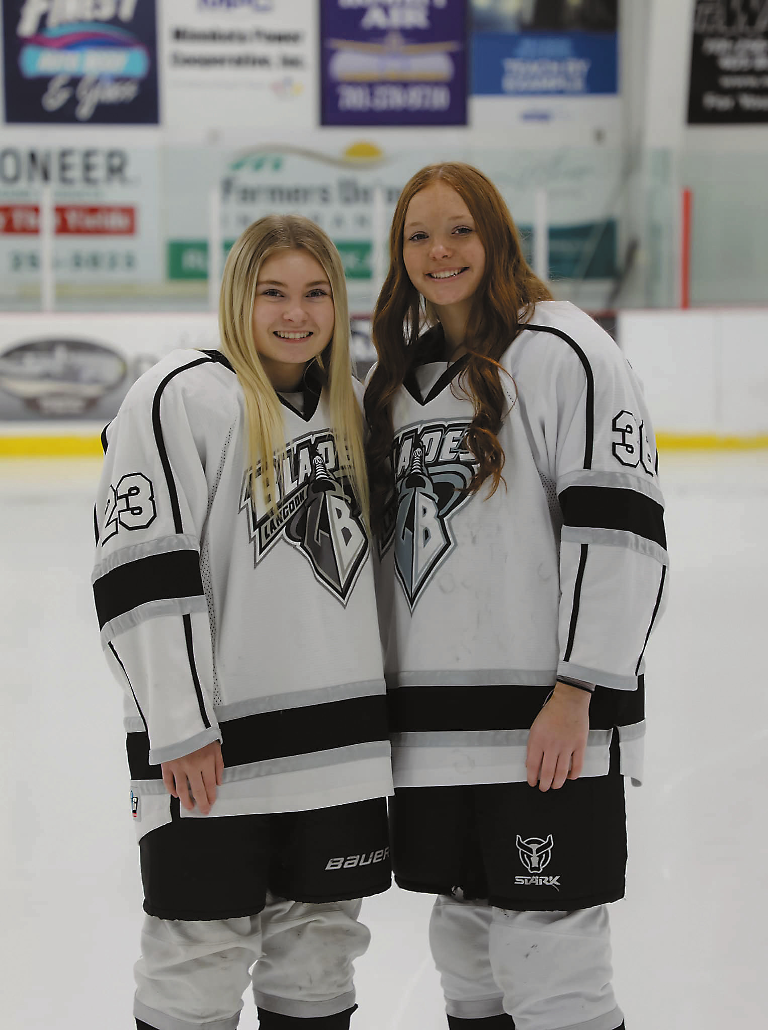 Catelyn Goodman and Alora Berke were honored before the game for Senior Night. Photo by Courtney Krom.
