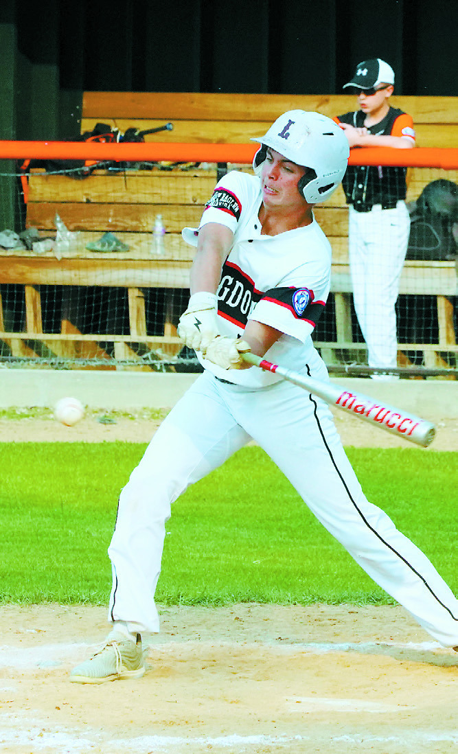 Dawson Downs connects for a base hit against Larimore. Phot by Larry Stokke.