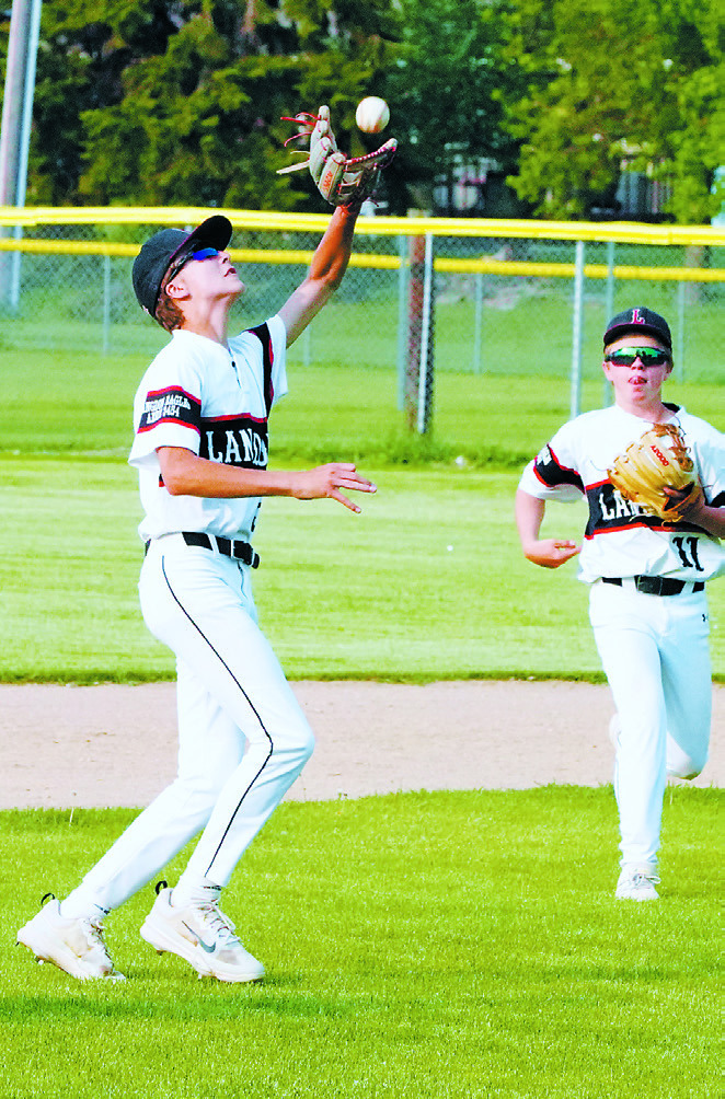 Grady Pankratz catches a pop fly for an out against Larimore. Photo by Larry Stokke.