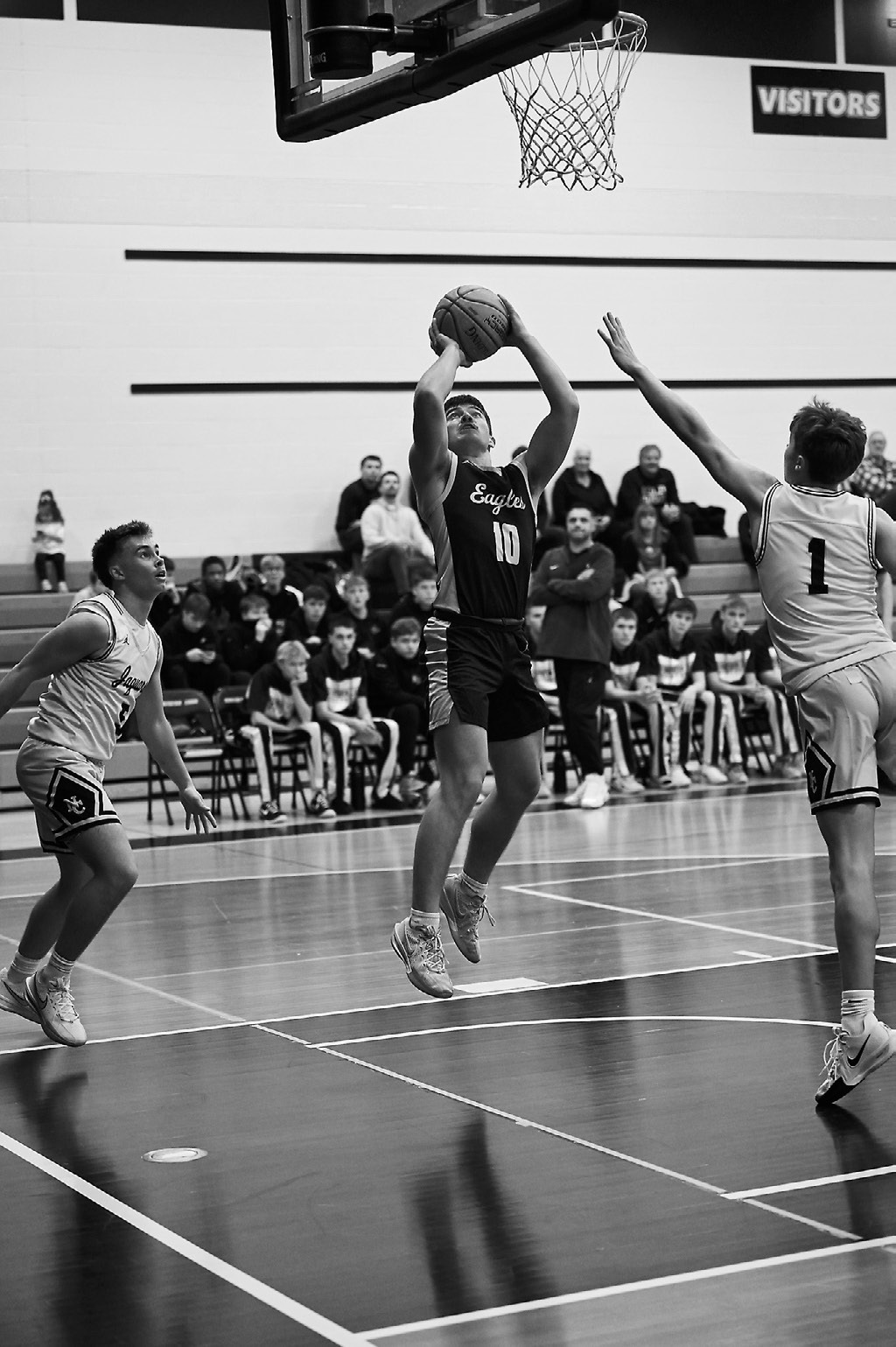 Colton Bailey sends one off from the right side of the net. Photo by Ashley Schafer.
