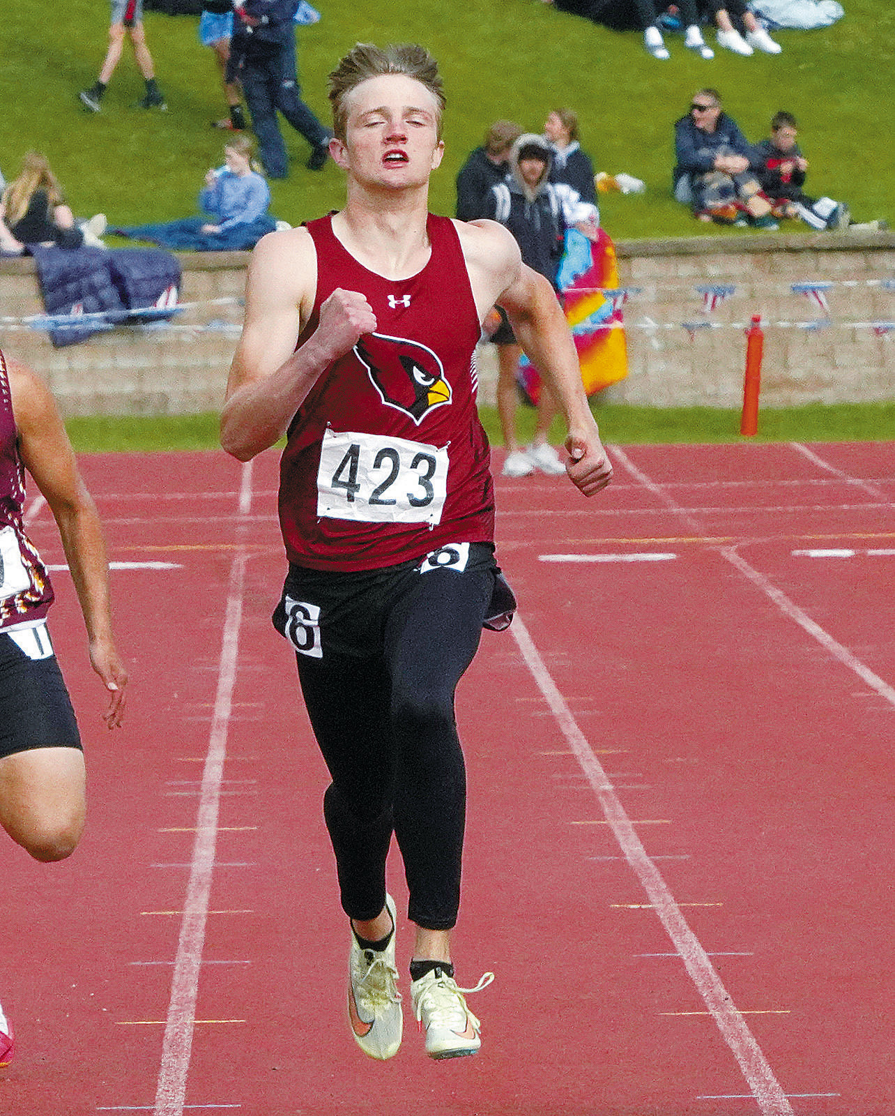 Cody Amble finished 2nd in the 400M at the State Meet with a time of 50.01, setting a personal best and a school record. He also placed 5th with a personal best in the triple jump at 42' 6 '. Photo by Larry Stokke.