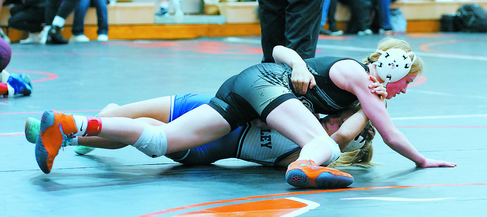 Charlotte Crowston pinned her opponent on her way to a runner-up finish in her weight class in Rugby Jan. 25. Photo by Larry Stokke.