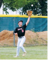 Bensen Fetsch makes the catch for the third out during Langdon's win over Park River. Photo by Larry Stokke