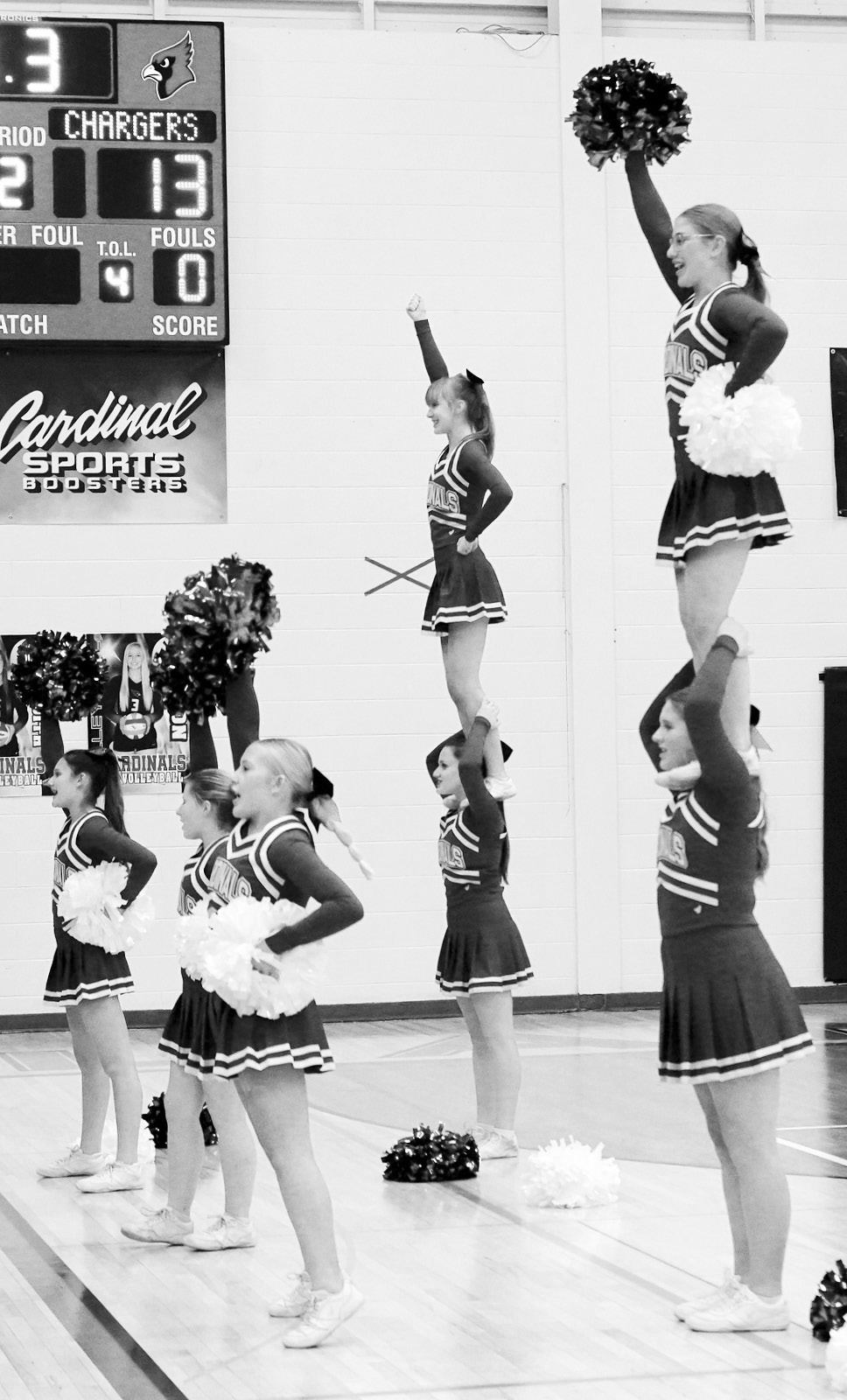 The Cardinal cheerleaders kept the crowd fired up in the first home game against Nelson County. Photo by Larry Stokke.