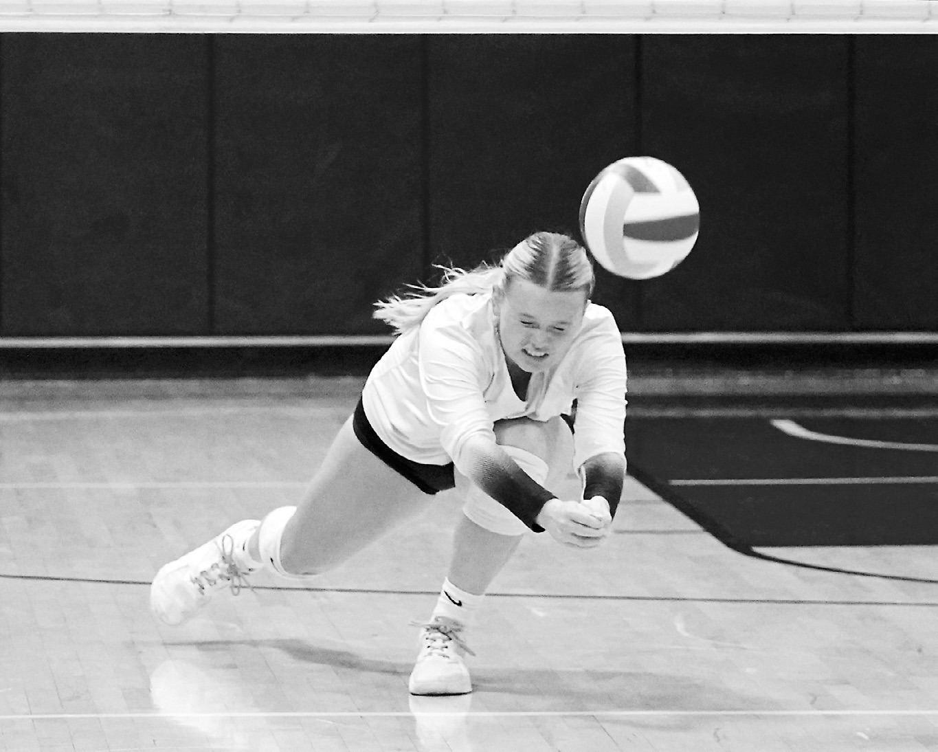 Jacy Fraser with a diving dig in the game against Midway-Minto in Pembina on Sept. 9. Jaelyn Johnson sends the ball through two Mustangs for a point. Photo by Larry Stokke. Photo by Larry Stokke.